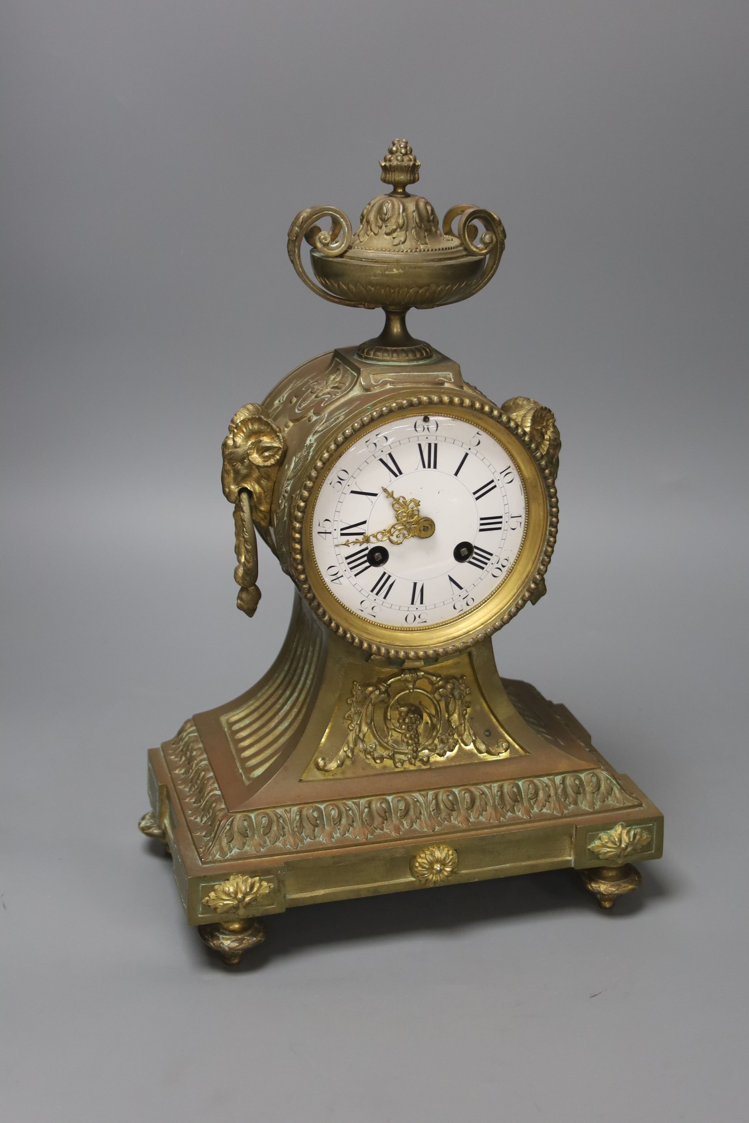 A Louis XVI style bronze mantel clock, height 38cm